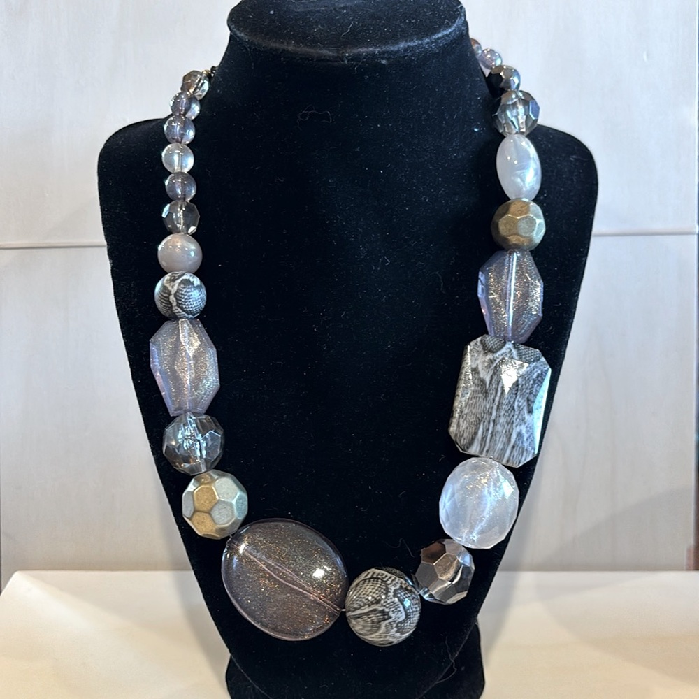 Necklace made with acrylic beads. Adjustable 18”to 20”. Pre-owned